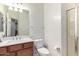 Bathroom showcasing a vanity with a sink, toilet, and a separate shower at 3532 E Alfalfa Dr, Gilbert, AZ 85298