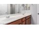 Bathroom featuring double sinks, a large mirror, and a vanity providing ample space at 3532 E Alfalfa Dr, Gilbert, AZ 85298