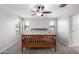 Bedroom with a ceiling fan and natural light, complemented by a comfortable carpet at 3532 E Alfalfa Dr, Gilbert, AZ 85298