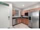 Modern kitchen featuring updated appliances, wood cabinets, and ample counter space for cooking at 3532 E Alfalfa Dr, Gilbert, AZ 85298