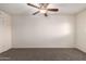 A bedroom with carpet and ceiling fan is ready for the next residents at 3635 W Cortez St, Phoenix, AZ 85029