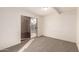 View of bedroom with neutral carpet and sliding glass doors to the outside at 3635 W Cortez St, Phoenix, AZ 85029