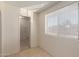 View of tiled laundry room and a window with blinds at 3635 W Cortez St, Phoenix, AZ 85029