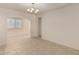 Inviting dining area features a chandelier and tile flooring at 3635 W Cortez St, Phoenix, AZ 85029