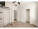 A bedroom with neutral carpeting and white walls at 37808 N Pagoda Ln, Phoenix, AZ 85086