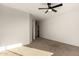 This bedroom has neutral carpeting and white walls at 37808 N Pagoda Ln, Phoenix, AZ 85086