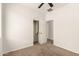 This bedroom features neutral carpet and closet access at 37808 N Pagoda Ln, Phoenix, AZ 85086