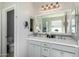 This bathroom features a dual vanity with a large mirror, offering ample space at 3781 S Pablo Pass Dr, Gilbert, AZ 85297