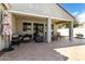 Covered patio area with comfortable seating, perfect for outdoor entertaining at 3781 S Pablo Pass Dr, Gilbert, AZ 85297