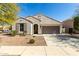 Charming single-story home with a two-car garage, desert landscaping, and a tile roof in a quiet neighborhood at 3781 S Pablo Pass Dr, Gilbert, AZ 85297