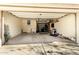 Spacious garage with golf simulator and room for storage and parking at 3781 S Pablo Pass Dr, Gilbert, AZ 85297