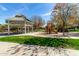 Community playground featuring a gazebo, playground equipment and lush landscaping at 3781 S Pablo Pass Dr, Gilbert, AZ 85297