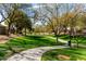 Scenic walking path winds through the community green space, offering a peaceful retreat at 3781 S Pablo Pass Dr, Gilbert, AZ 85297