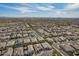 Gorgeous aerial view of a sprawling residential neighborhood with mountain views in the distance at 3793 E Canyon Pl, Chandler, AZ 85249