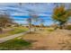 A community park area shows grass and trees and a walking path under a blue sky at 3793 E Canyon Pl, Chandler, AZ 85249