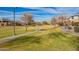 A community park area shows grass and trees and a paved walking path under a blue sky at 3793 E Canyon Pl, Chandler, AZ 85249