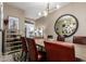 Elegant dining room featuring unique decor, stylish furniture, and modern lighting fixtures at 3793 E Canyon Pl, Chandler, AZ 85249