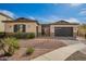 Charming single-story home with a well-manicured front yard, two-car garage and inviting curb appeal at 3793 E Canyon Pl, Chandler, AZ 85249