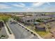 A beautiful aerial neighborhood view including Avian Meadows community sign and desert landscaping at 3793 E Canyon Pl, Chandler, AZ 85249