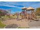 Community playground with slides, climbing structures, and sand pit for hours of fun at 3793 E Canyon Pl, Chandler, AZ 85249