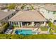 Aerial view of the backyard and private pool with lounge chairs and outdoor seating at 3793 E Canyon Pl, Chandler, AZ 85249