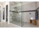 Modern shower with gray tile, a frameless glass door, and sleek fixtures at 3793 E Canyon Pl, Chandler, AZ 85249