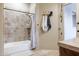 Bathroom featuring a tiled shower and tub combination with a shower curtain at 39610 N 12Th St, Phoenix, AZ 85086