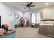 Playful bedroom featuring a playhouse, built-in desk, and comfortable bed for sleep and creativity at 39610 N 12Th St, Phoenix, AZ 85086