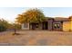 Stucco home with desert landscaping, an arched entryway, and an inviting facade at 39610 N 12Th St, Phoenix, AZ 85086