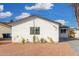 Well-maintained single-story home featuring xeriscaping, a neat lawn, and a paved driveway at 42 E 14Th St, Mesa, AZ 85201