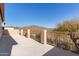 Outdoor balcony overlooking desert scenery, offering a great view of the mountains at 42829 N Livingstone Way, Anthem, AZ 85086