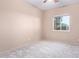 Neutral bedroom with a carpet floors and bright windows at 42829 N Livingstone Way, Anthem, AZ 85086