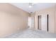 Neutral bedroom with a carpet floors, a ceiling fan, and closet storage at 42829 N Livingstone Way, Anthem, AZ 85086