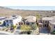 Aerial view of a single-Gathering home with desert landscaping, tile roof and a two car garage at 42829 N Livingstone Way, Anthem, AZ 85086