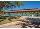 Daisy Mountain Railroad covered station with benches and green fencing at 42829 N Livingstone Way, Anthem, AZ 85086