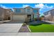 Two-story home with manicured landscaping, providing excellent curb appeal at 43819 W Wolf Dr, Maricopa, AZ 85138