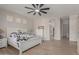 Bright main bedroom featuring luxury vinyl plank flooring, and neutral paint at 450 E Alamosa Dr, Chandler, AZ 85249