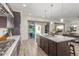 Spacious kitchen island perfect for cooking or entertaining, seamlessly connected to the living area at 4684 N 206Th Ave, Buckeye, AZ 85396