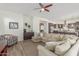 Open-concept living area with comfortable seating and seamless flow into the kitchen space at 4684 N 206Th Ave, Buckeye, AZ 85396