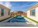 Backyard pool with tile and turf at 4684 N 206Th Ave, Buckeye, AZ 85396