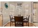 Bright breakfast nook with a modern chandelier and picturesque views from the window at 5009 E Baker Dr, Cave Creek, AZ 85331