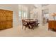 Cozy dining area featuring bench seating, a decorative light fixture, and bright windows at 5009 E Baker Dr, Cave Creek, AZ 85331