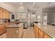 Well-equipped kitchen featuring granite countertops, an island, and stainless steel appliances at 5009 E Baker Dr, Cave Creek, AZ 85331