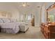 Spacious main bedroom featuring neutral tones, vaulted ceilings, and outdoor access at 5009 E Baker Dr, Cave Creek, AZ 85331