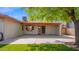 Expansive back patio with covered space, perfect for outdoor entertaining and shaded relaxation at 5216 W Beryl Ave, Glendale, AZ 85302