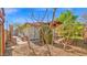 Relaxing backyard view with a covered patio space, ideal for enjoying the serene outdoor setting at 5216 W Beryl Ave, Glendale, AZ 85302