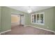 Elegant dining room with modern light fixture, shutters, new floors, and comfortable space at 5216 W Beryl Ave, Glendale, AZ 85302