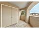 Covered patio featuring a large storage door at 5249 E Shea Blvd # 214, Scottsdale, AZ 85254