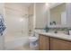 Bathroom with a combined shower and tub, a single sink vanity and tile floors at 5400 S Hardy Dr # 110, Tempe, AZ 85283