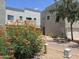 Modern two-story townhome featuring desert landscaping and a private entrance at 5400 S Hardy Dr # 110, Tempe, AZ 85283